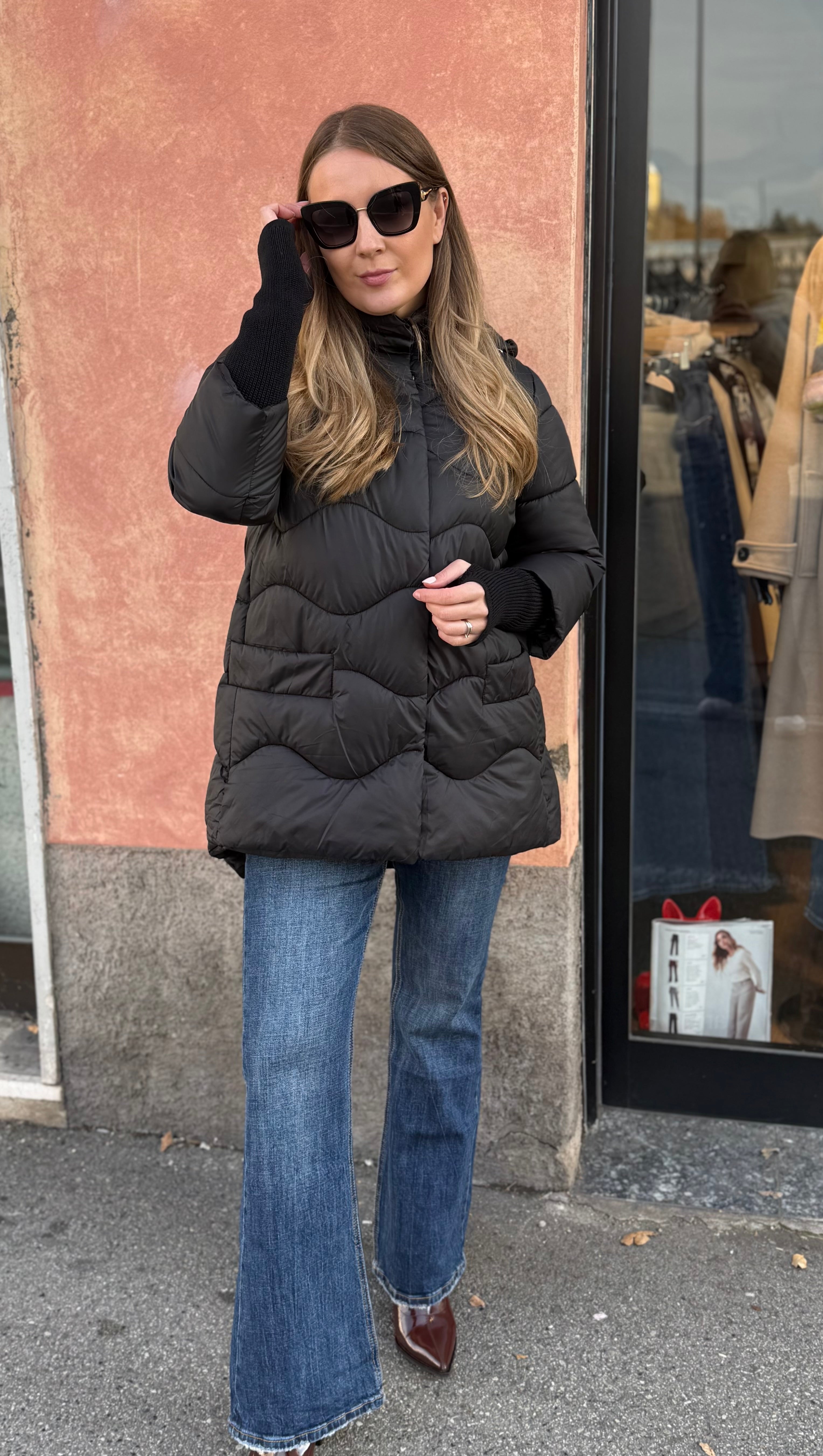 Piumino manica in maglia nero