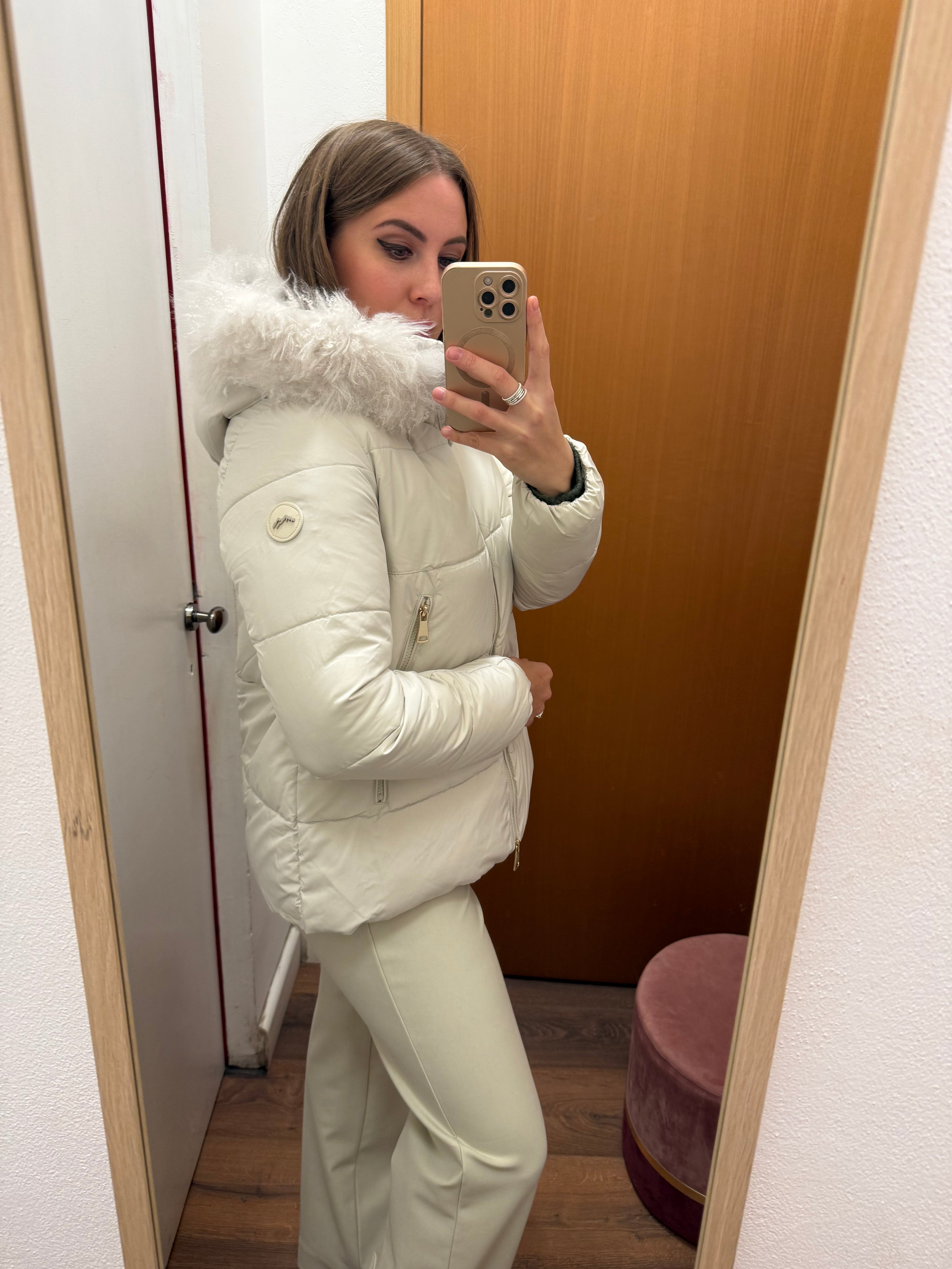 Piumino corto con cappuccio colore ghiaccio