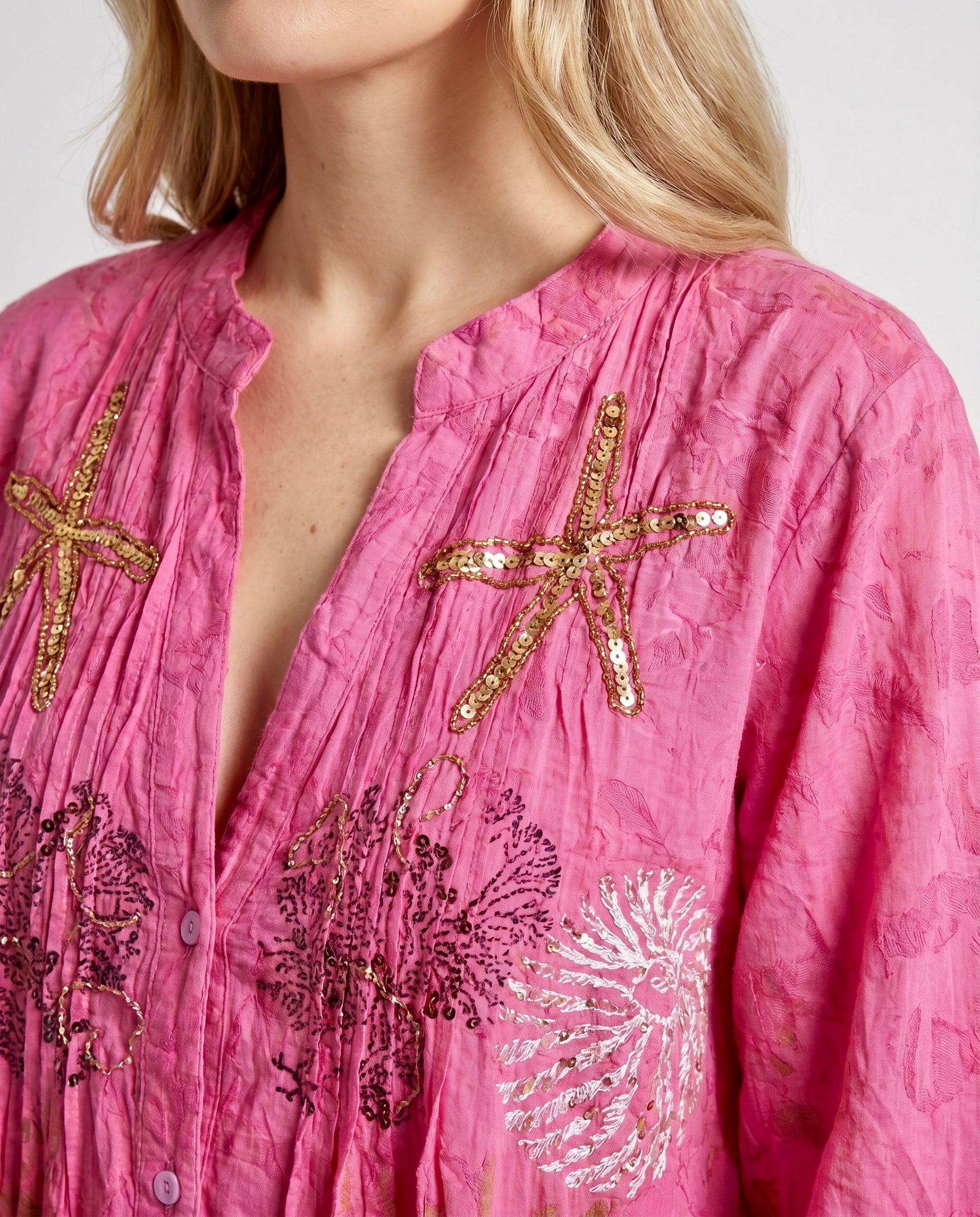 Abito chemisier fucsia con ricami e paillettes stile marino