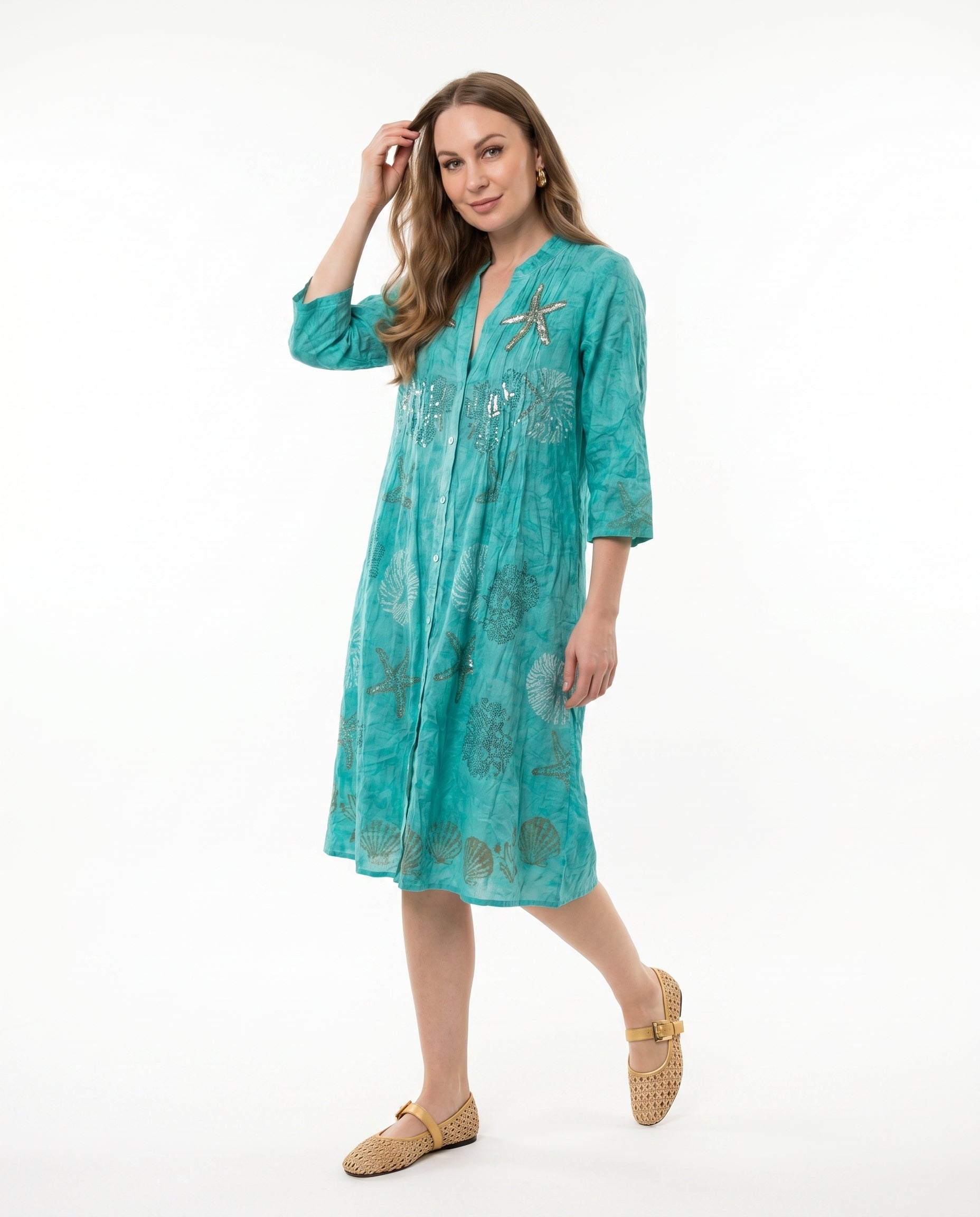 Abito chemisier acquamarina con ricami e paillettes stile marino