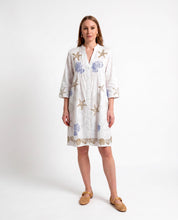Abito chemisier bianco con ricami e paillettes stile marino