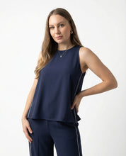 Completo fluido blu navy con profili bianchi